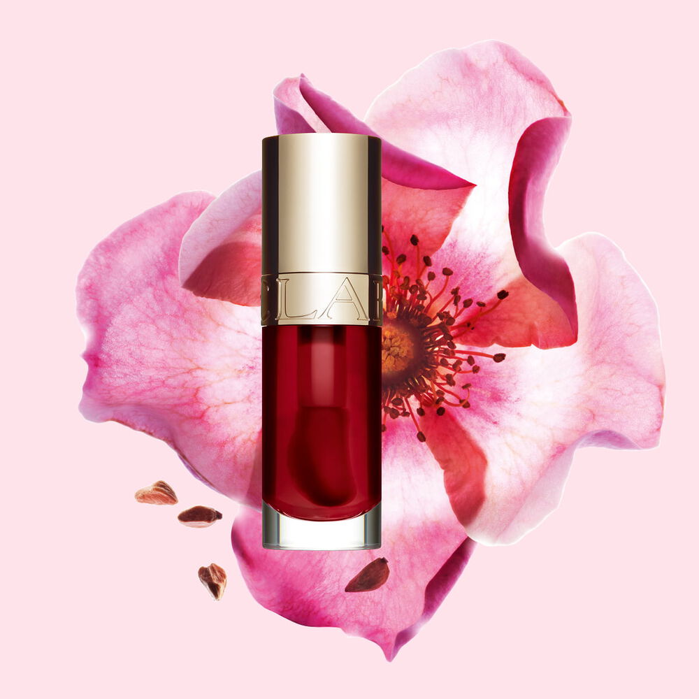 Clarins Lip Comfort Oil combines intense lip care with a glossy finish to sublimate your smile like a rich tinted lip oil.