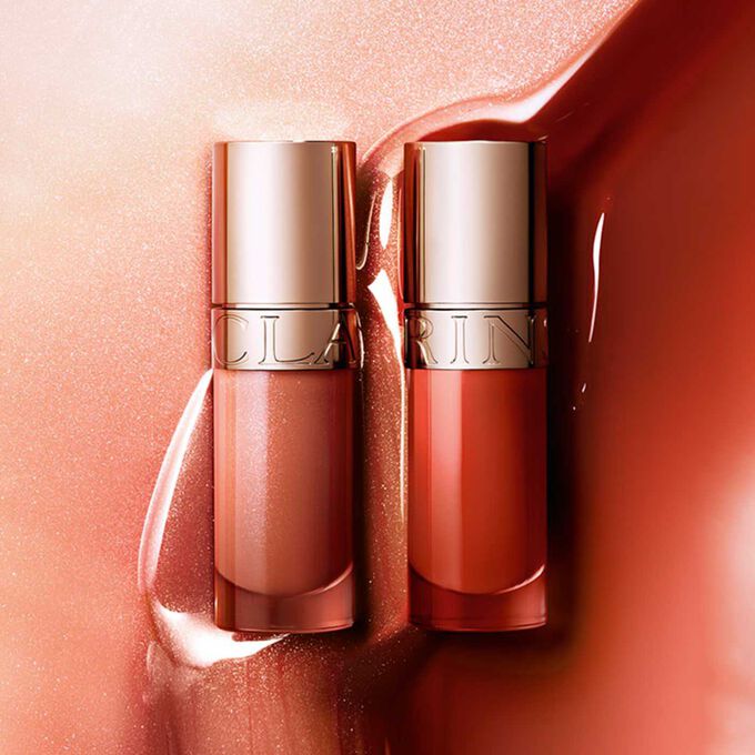 Clarins Lip Comfort Oil - Limited Edition, featuring two shades, hydrating and plumping with natural origin ingredients.
