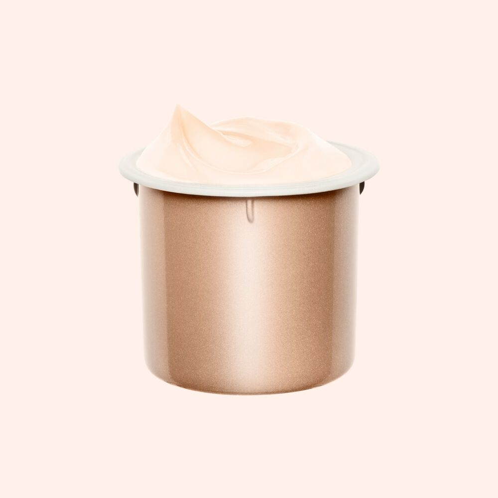 Packshot of the Extra Firming Day cream with SPF skin refill shot on a light pink backgrlound