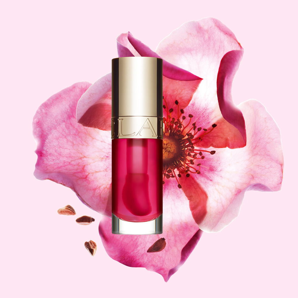 Clarins Lip Comfort Oil combines intense lip care with a glossy finish to sublimate your smile like a rich tinted lip oil.