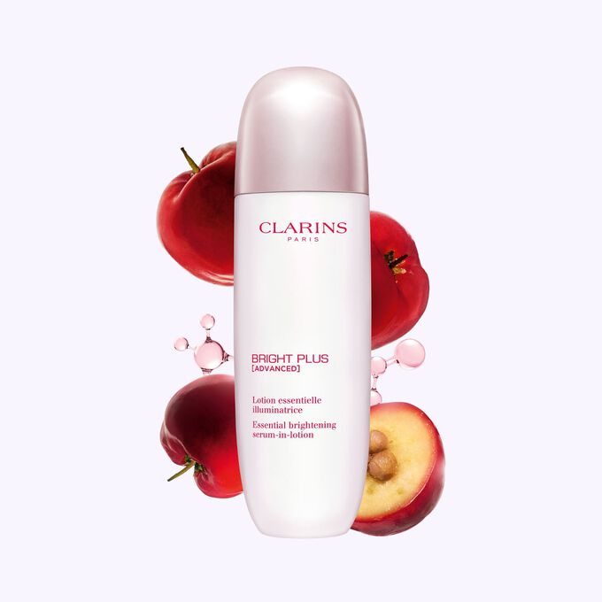 Packshot of Clarins Brightening Lotion placed next to acerola fruits and a niacinamide molecule on a light grey background.
