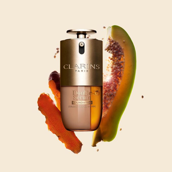 Packshot of Clarins Double Serum Foundation available for every skin tone, featuring key ingredients turmeric and papain
