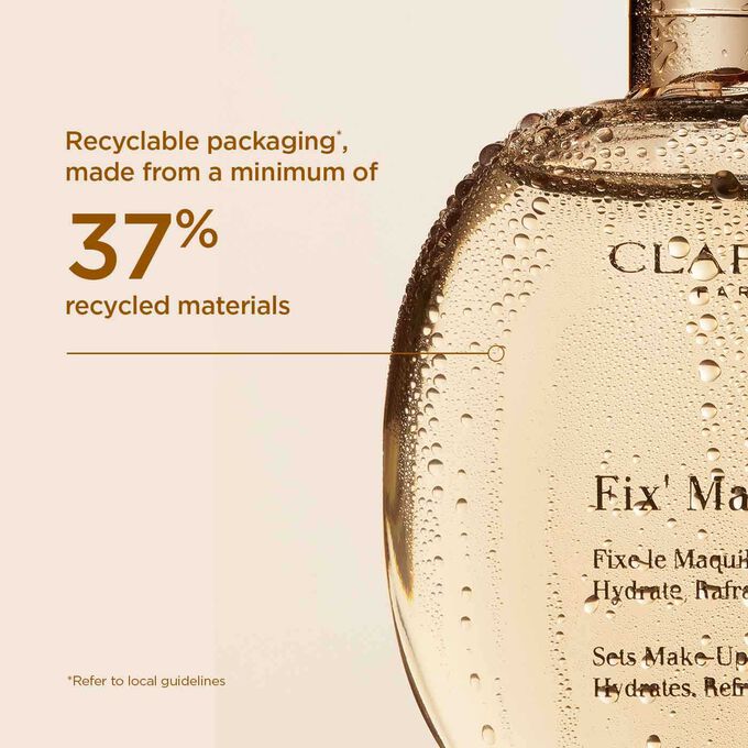 Close-up of the Makeup Fixer Spray glass bottle, illustrating that it is made from 40% recycled glass and produced in France