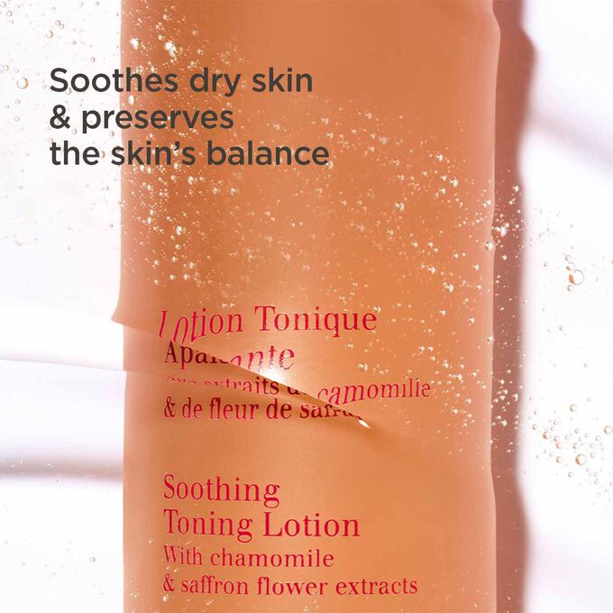 Packshot of the orange bottle of the soothing toning  facial lotion half under water with text about its soothing and hydrating actions