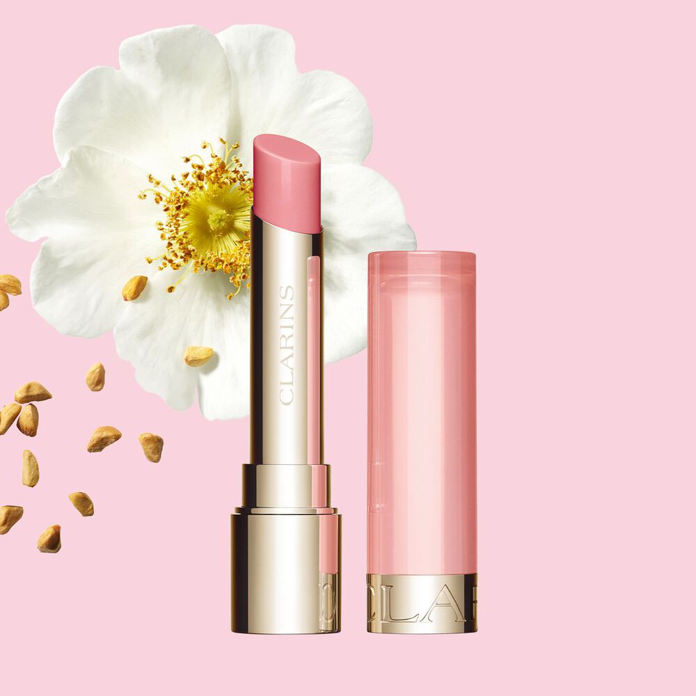 Clarins Nourishing Lip Oil Balm giving a subtle pink honey finish