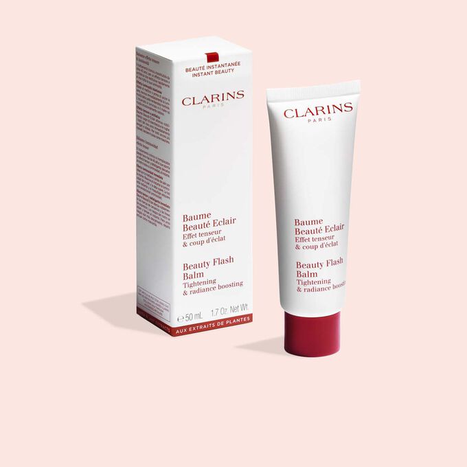 Tube of Clarins Beauty Flash Balm with its packaging, illustrating the recyclable origin of the materials.