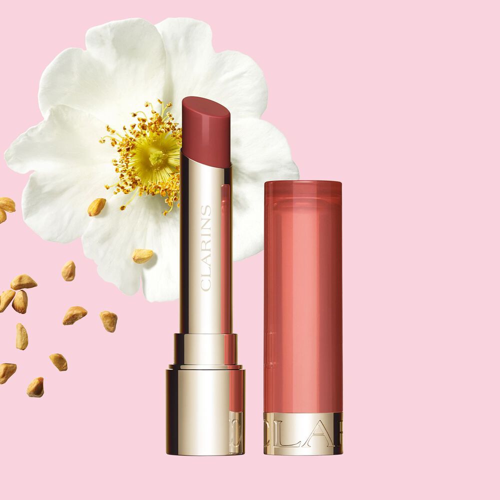 Clarins Nourishing Lip Oil Balm giving a subtle dark red finish