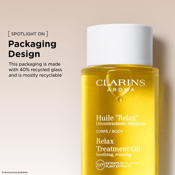 Clarins relaxing body oil in a packaging made with recycled glass, supporting sustainable and eco-friendly beauty.