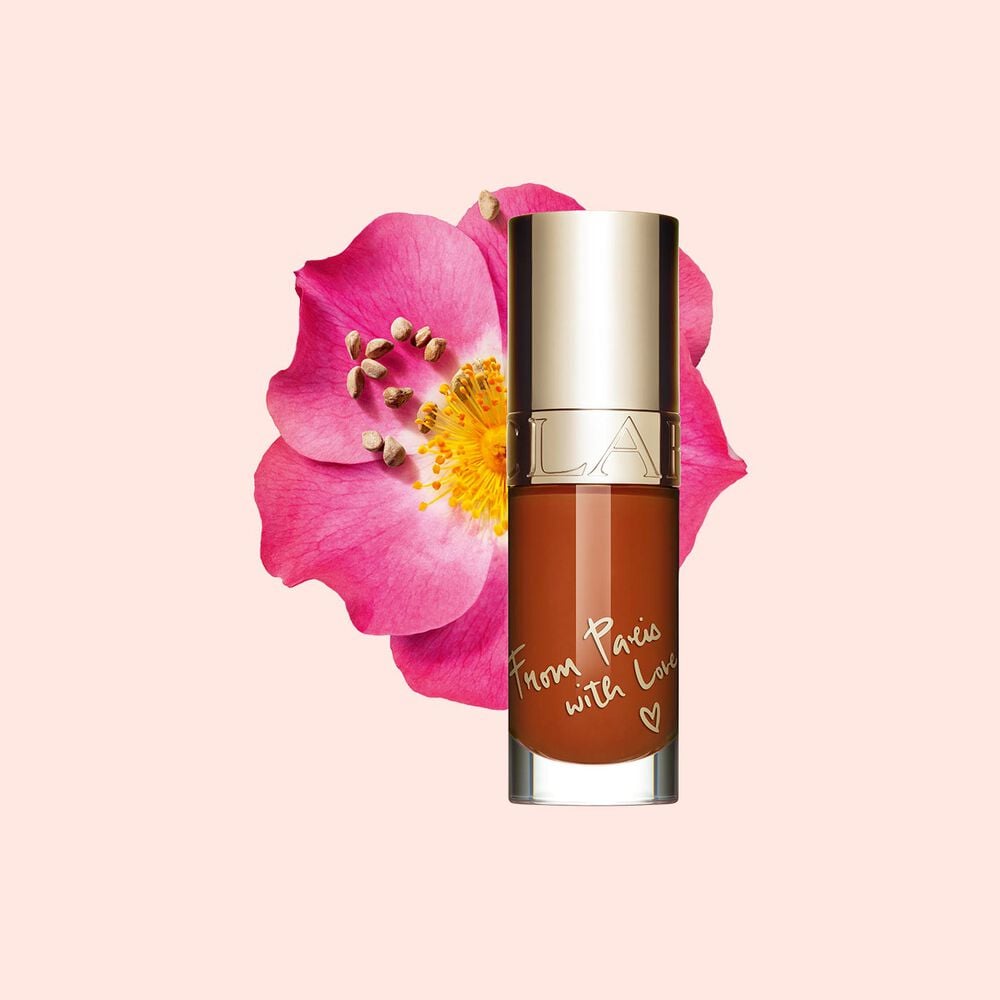 Clarins Lip Comfort Oil - Limited Edition in Brick shade, offering hydration, plumping, and all-day nourishment.