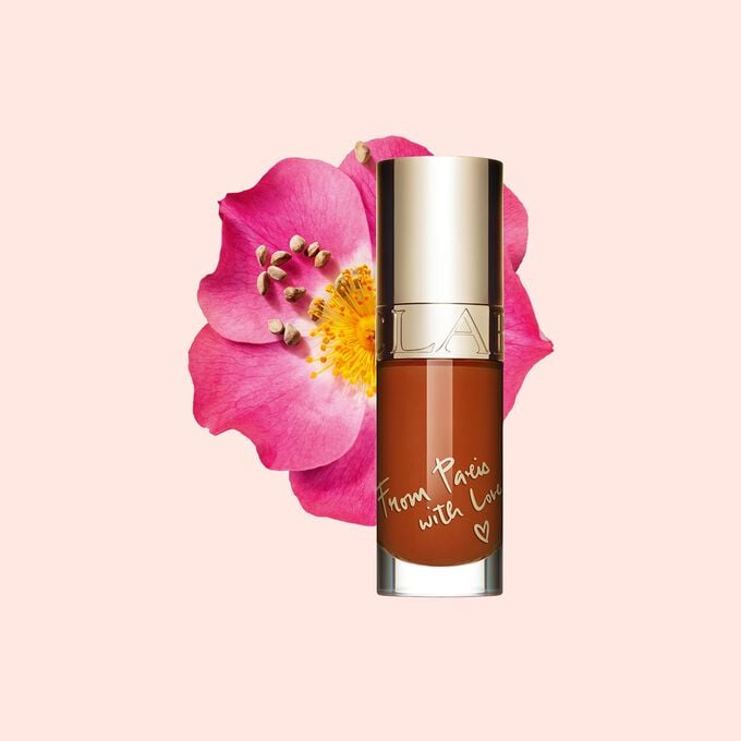 Clarins Lip Comfort Oil - Limited Edition in Brick shade, offering hydration, plumping, and all-day nourishment.