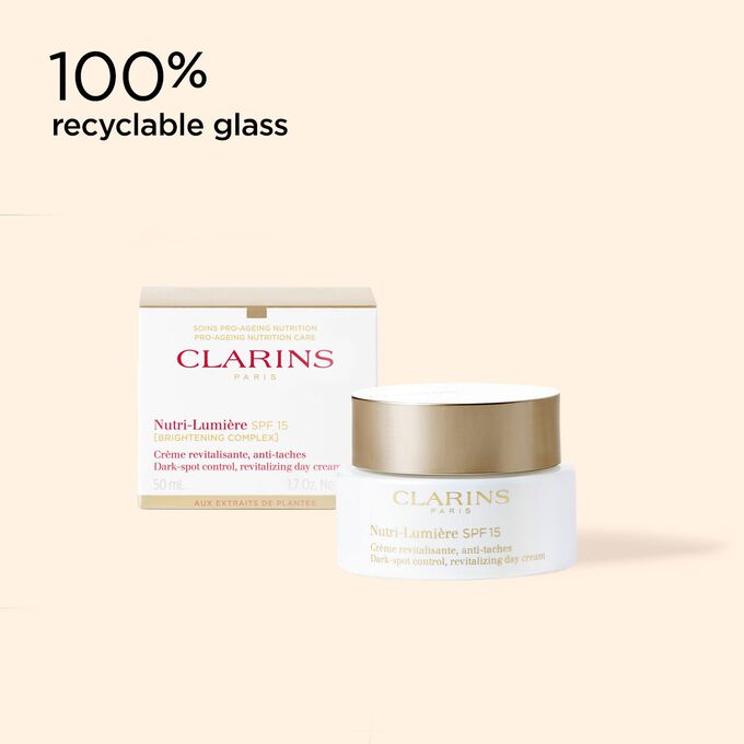Cream jar of anti-aging cream: Nutri-Lumière SPF 15 and its packaging to illustrate the recyclable origin of the packaging.