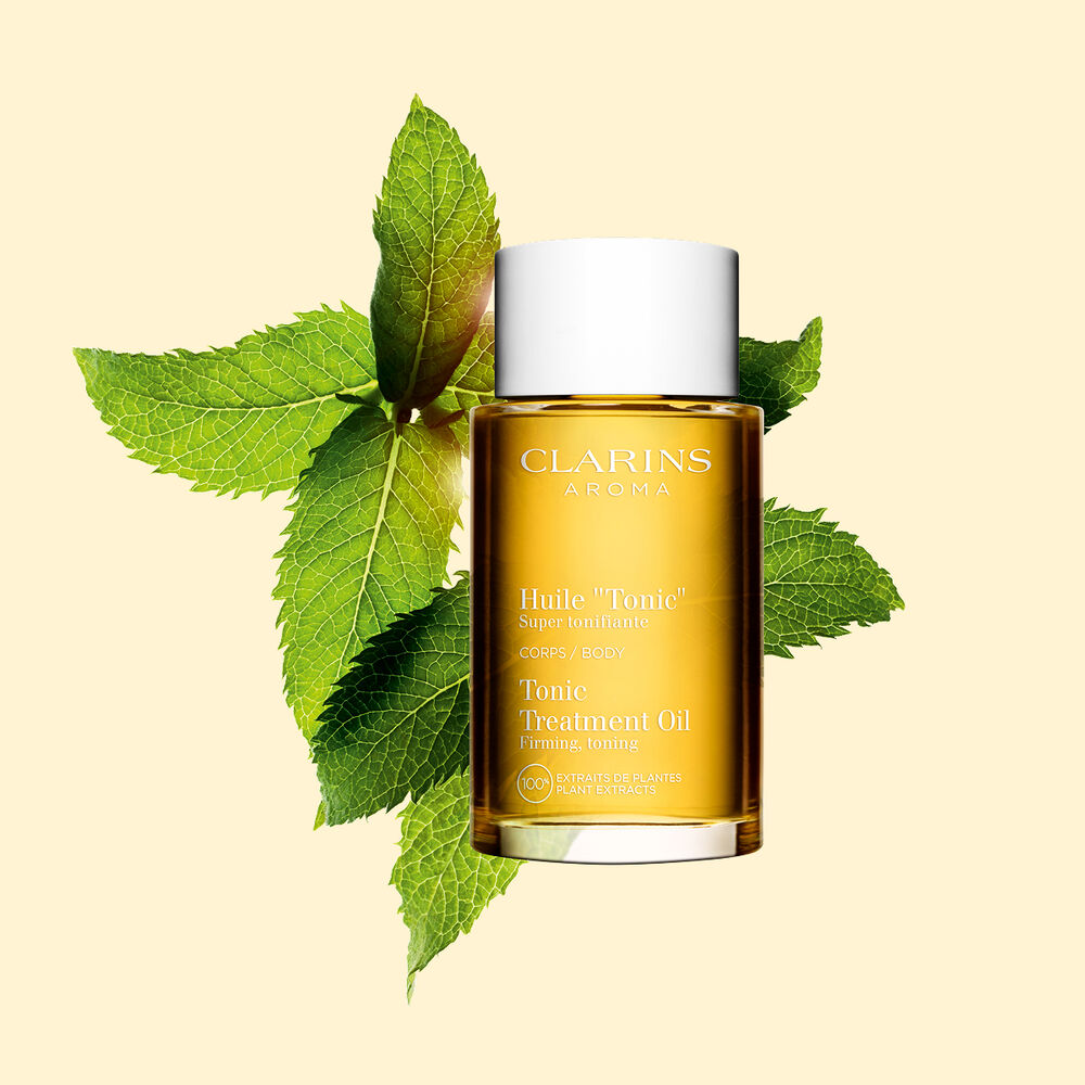 Clarins Tonic Body Treatment Oil with plant extracts for firming and toning the skin with a fine, non greasy oil.