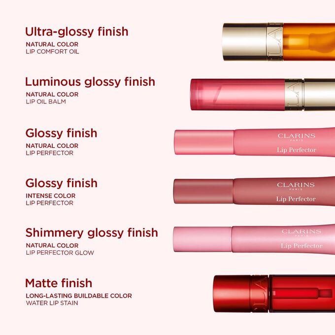 Selection of Clarins glossy lip makeup, organised by gloss finish intensity.