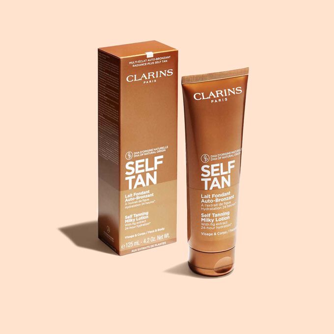 Tube of Clarins Self Tanning Milky Lotion and its packaging to illustrate the recyclable origin of the packaging.