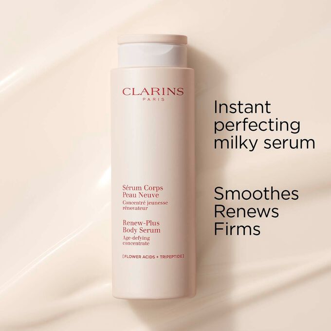 Clarins Instant Perfecting Milky Serum for the body on a textured creamy background to emphasize its smoothing and firming action