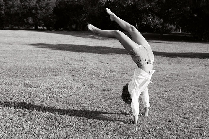 Woman doing a handstand